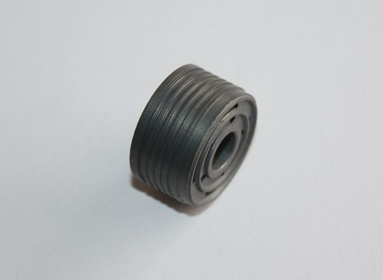 घनत्व 6.6g/cm3 सिंटर शॉक पिस्टन स्वचालित ग्रूविंग मशीन द्वारा निर्मित